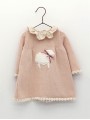 Knitted baby girl dress with little sheep