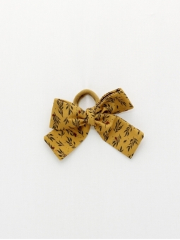 Girl scrunchie with mustard pattern bow
