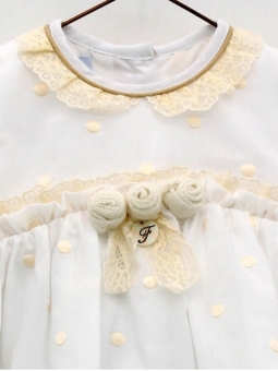 Romper-style girl baby dress with embroidered bobble stitches