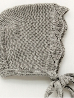Garter stitch baby bonnet with openwork wave