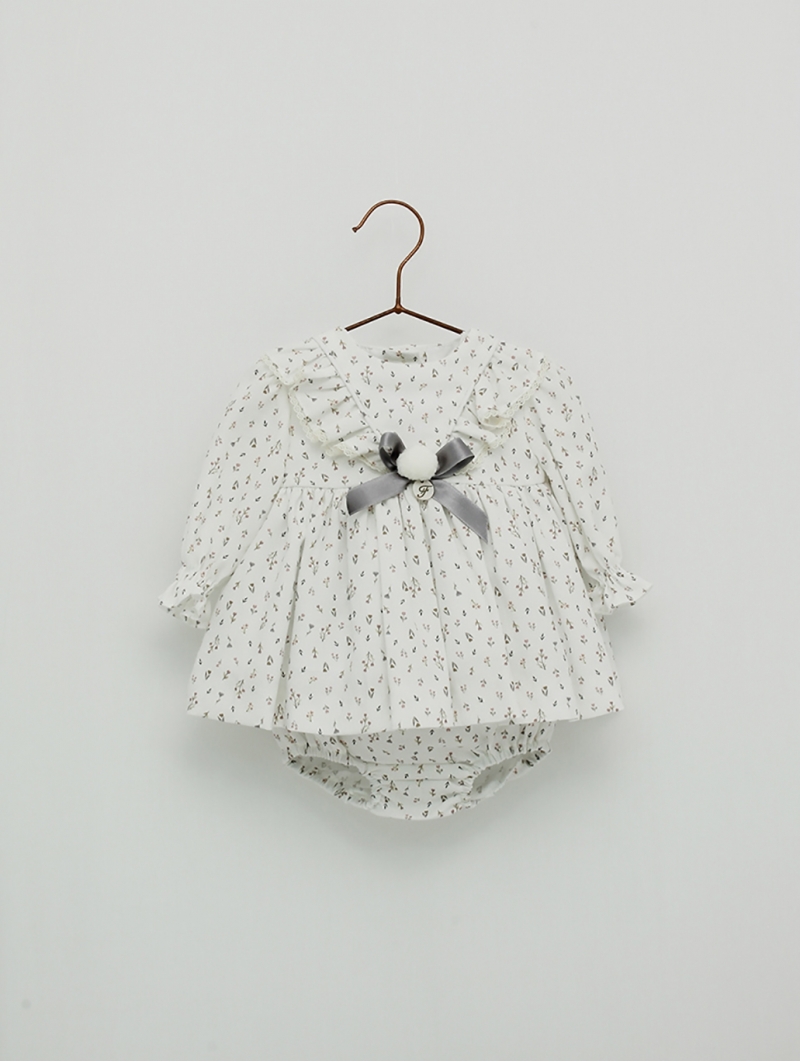 romper Stamped detail bow and pom pom