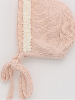 Knitted baby bonnet with wave