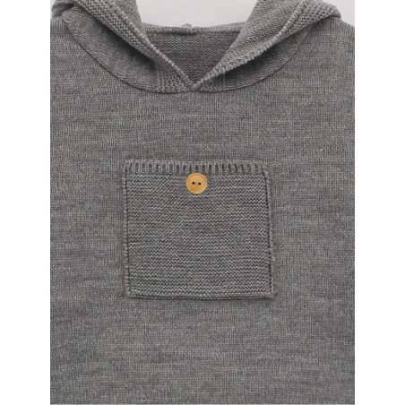 Hooded sweater with a pocket adorning