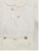 Conjunto blusa de batista bordada e calça curta