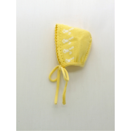 Knit yellow bonnet with bunnies framework