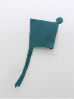 Knitted bonnet with pom pom
