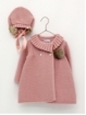 Knitted coat and bonnet with pom pom