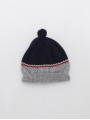 Gorro com greca e pompón