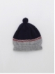 Gorro com greca e pompón