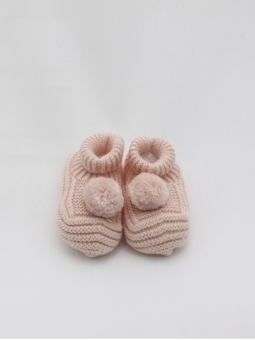 Knitted booties with pompom