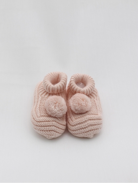 Knitted booties with pompom