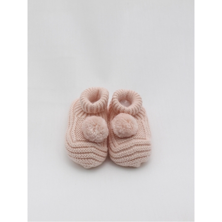 Knitted booties with pompom
