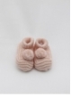 Knitted booties with pompom