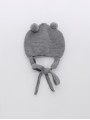 Bonnet with earflaps and pompoms