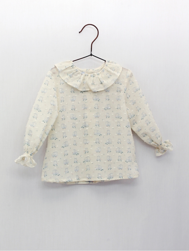 Blusa plumeti pescoço volante