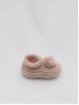 Knitted booties with pompom
