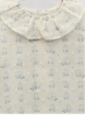 Blusa plumeti pescoço volante