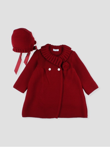 Knitted coat and bonnet with pompoms