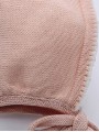 Knitted bonnet with combined start