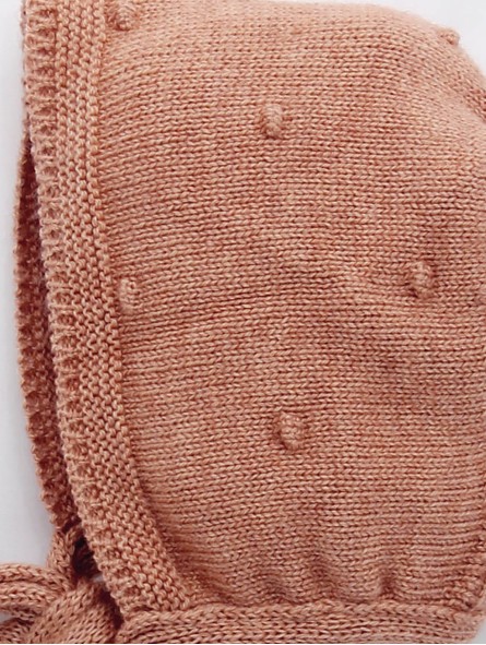 Bonnet with raised embroidery