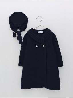 Knitted coat and bonnet with pompoms